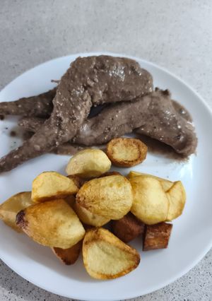 Una foto de Conejo con Salsa de Almendras