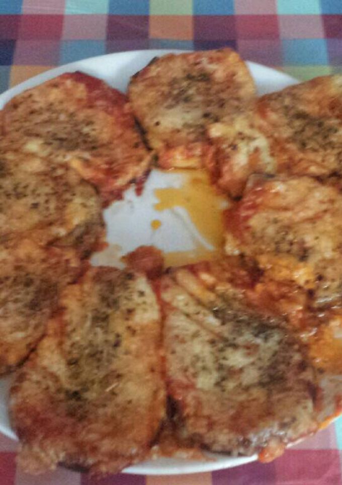 Una foto de Berenjenas a la parmesana