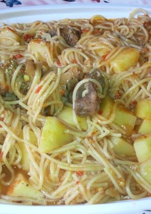 A picture of Spaghetti & Irish potatoes jollof.