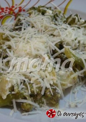 A picture of Sautéed broccoli with feta cheese.