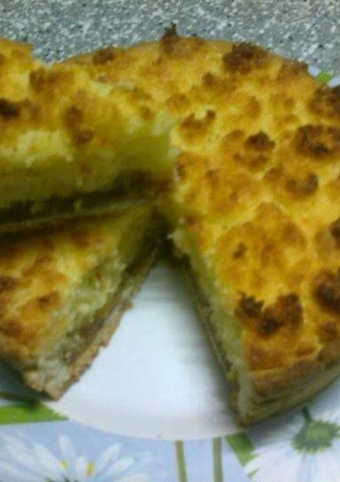 Una foto de Tarta de coco y dulce de leche (coqueta)