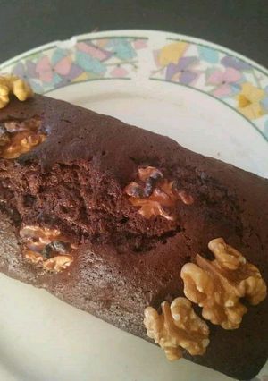 Una foto de Budín de chocolate con nueces 🖤🖤