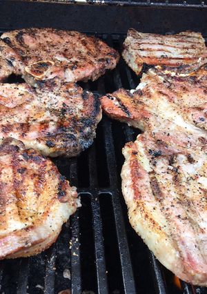 A picture of Lemon pepper grilled pork chops.