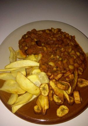 A picture of Beans, fried plantain and potatoes.