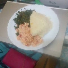A picture of Ugali sukuma mayai.