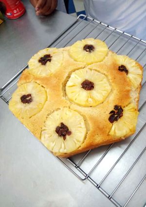 A picture of Pineapple upside down.