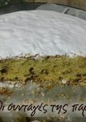 A picture of Vasilopita with chocolate chips and hazelnuts.