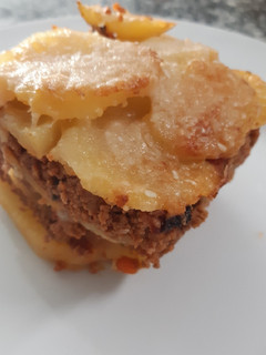 Una foto de Pastel de papas con boloñesa