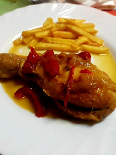 Una foto de Pollo "en asaillo"