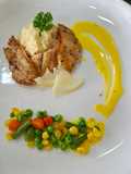 Seared dory with mashed potato mix vegetables and hollandaise sauce