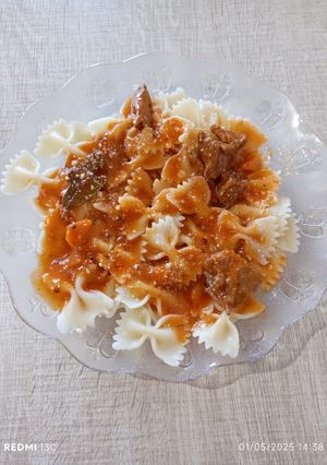 A picture of Stew with Mozzarella and Orange Juice.