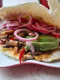 Pita bread with pork and avocado