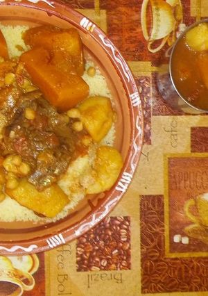 A picture of Couscous with Meat and Vegetables.