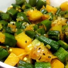 A picture of Lady's finger and pumpkin stir fry.