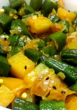 A picture of Lady's finger and pumpkin stir fry.