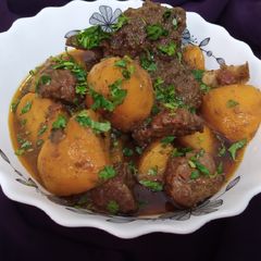 A picture of Aloo Gosht.