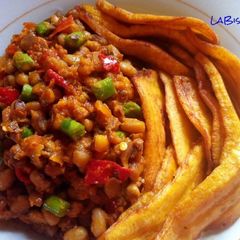 A picture of Stir fry porriage beans and fried plantain.