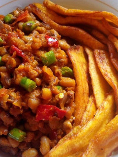 A picture of Stir fry porriage beans and fried plantain.