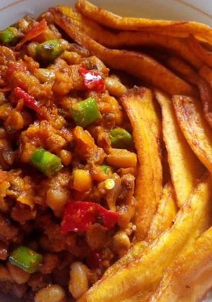 A picture of Stir fry porriage beans and fried plantain.