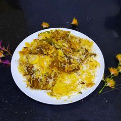 A picture of Mom's special Mutton biryani.