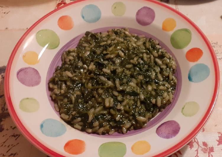 Risotto con spinaci freschi al profumo d'arancia