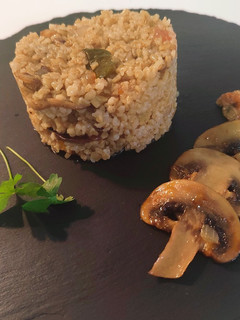 Una foto de Bulgur con champiñones