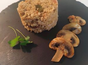 Una foto de Bulgur con champiñones