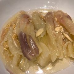 A picture of Steamed aubergine with lemon, olive oil and garlic.