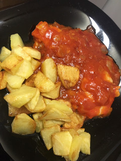 Una foto de Bacalao con tomate