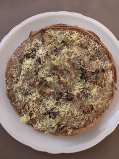 Una foto de Pastel de crêpes jamón champiñones