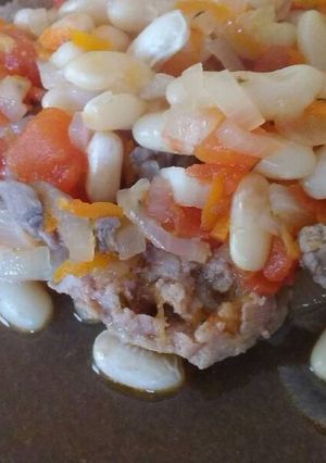 Una foto de Porotos y carne