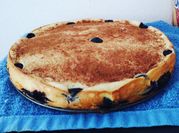 Una foto de cheesecake de moras