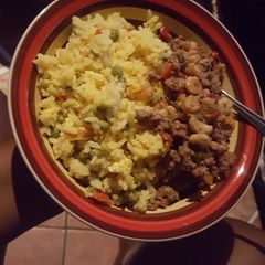A picture of Shrimp & Beef with Egg Fried Veggie Rice.
