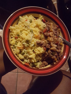 A picture of Shrimp & Beef with Egg Fried Veggie Rice.