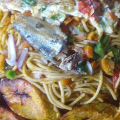 A picture of Garnished spaghetti.