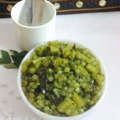 A picture of Sago pearls in green chutney.