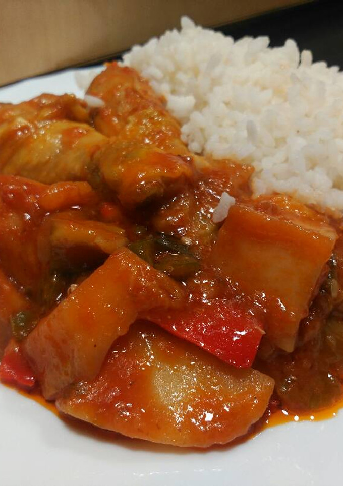 Una foto de Pollo con Pisto y Arroz