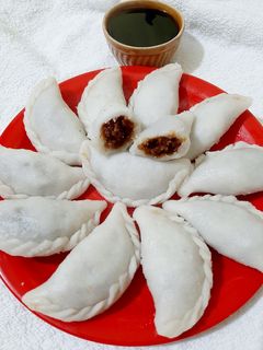 ভাপা পুলি পিঠে (bhapa puli pithe recipe in Bengali) রেসিপির প্রধান ছবি