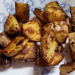 A picture of Crispy Roasted Seasoned Potatoes.