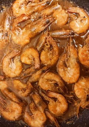 A picture of Buttered garlic Prawn w/sprite and hoisin sauce.