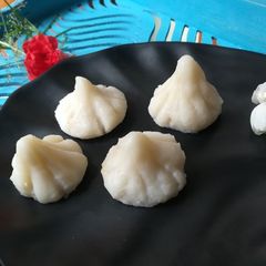 A picture of Cashew stuffed modak.