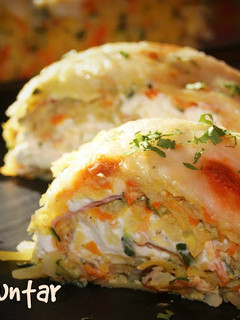 Una foto de Brazo de verduras relleno