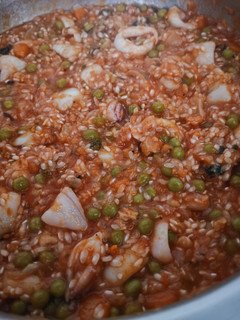 Una foto de Arroz de chipirones