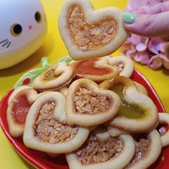 A picture of Heart Cookies 💞 with Honey Almond Filling.