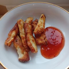 A picture of Hallumi Fries with sweet chilli dip.