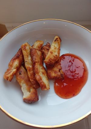 A picture of Hallumi Fries with sweet chilli dip.