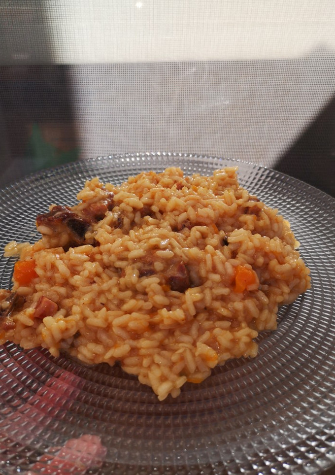 Una foto de Arroz meloso de costilla y calabaza