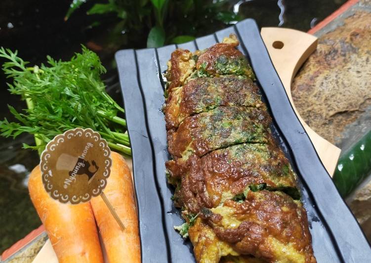 Carrot leaves Thai omelette (Cha-om Tord)