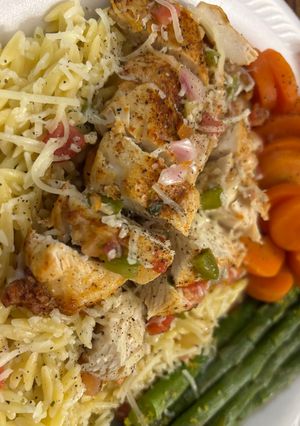 A picture of Grilled Chicken and Vegetable Orzo Fiesta.