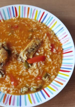 Una foto de Arroz caldoso con pollo